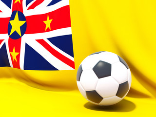 Fototapeta premium Flag of niue with football in front of it