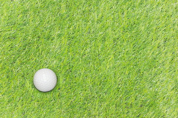 golf ball on green grass