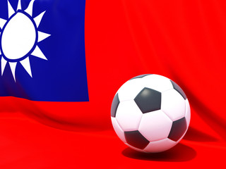 Naklejka premium Flag of republic of china with football in front of it