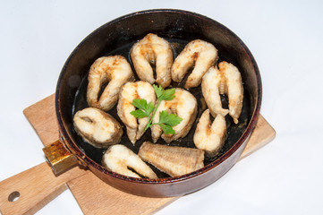 Fried fish with herbs and lemon juice