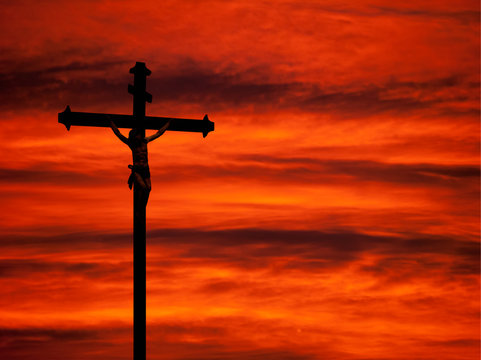 Easter religious background - crucifixion and sunset red sky