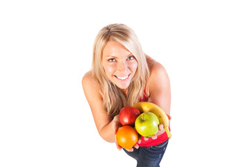 Fototapeta na wymiar Young smiling woman with fruits on a white background