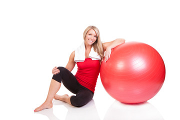Fototapeta premium Portrait of pretty young woman doing exercise