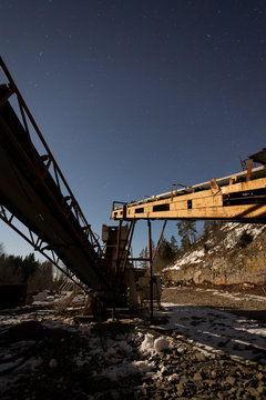 Old quarry machinery at night