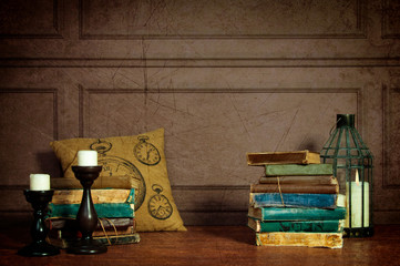 Decoration of books, candles and pillows cells.