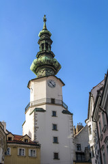 Fototapeta na wymiar St. Michael's Gate. Clock tower.