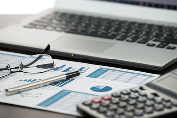 Businessman analyzing investment charts