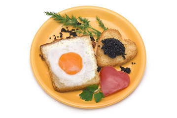 Romantic Breakfast: toast, egg, heart-shaped paprika and caviar