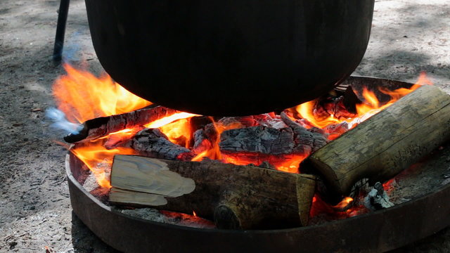 Cooking dinner on campfire