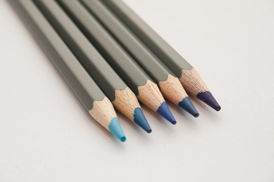 Blue Colouring Pencils on a white background