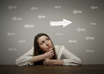Uncertain. Girl in white and arrows.
