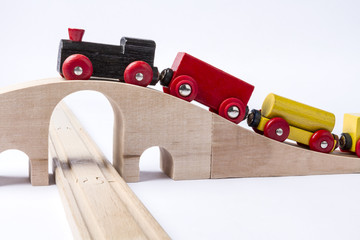 wooden toy train on bridge
