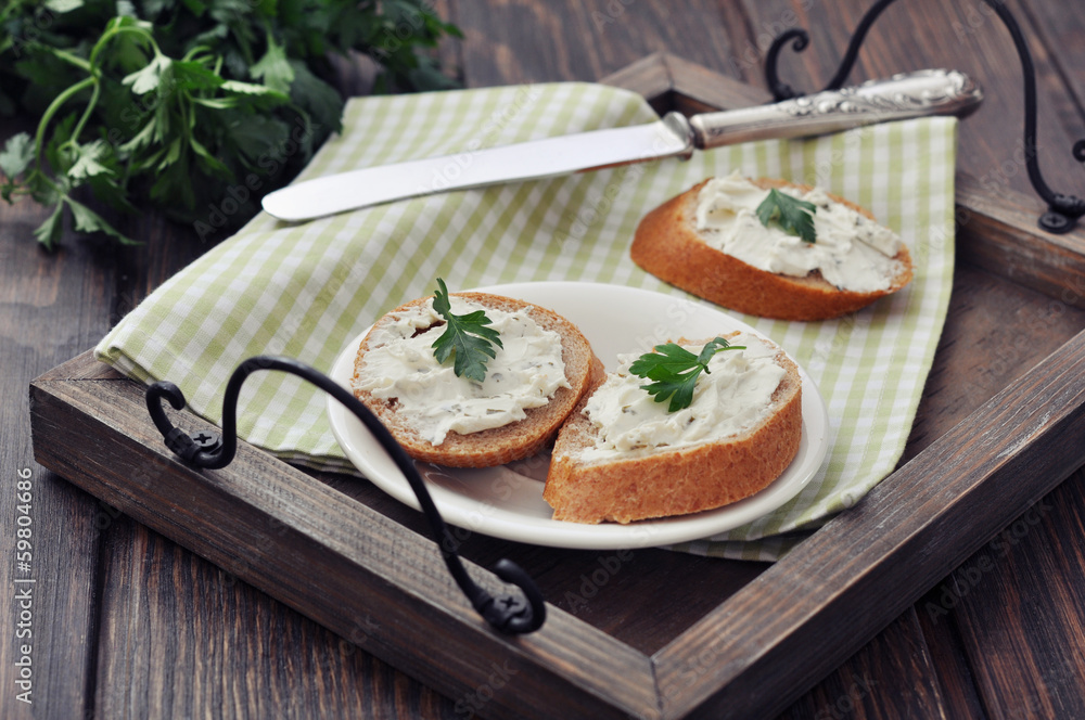 Wall mural Slice of bread with cream cheese