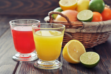 Fototapeta premium Citrus juice and fruits
