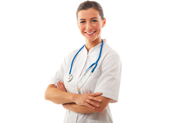 Fototapeta premium Smiling Woman doctor with arms crossed stands over white backgro