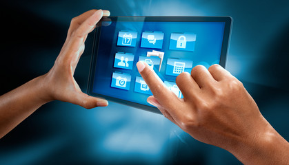 a woman finger is selecting a folder on a tablet PDA