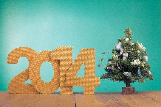 Greeting card with date and New Year tree