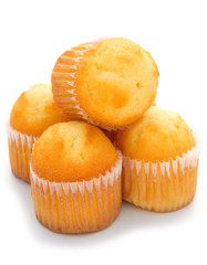 cup cakes stack up on a white background