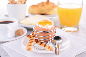 breakfast with egg, juice and coffee