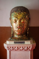 Buddha head in Wat Mongkol Bophit temple in Ayutthaya, Thailand.