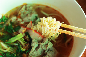 Pork noodles in soup asian style