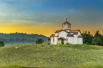 church on the top of the heel at sunset 
