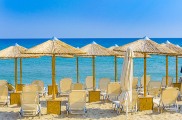 Sun loungers with an umbrella on the beach