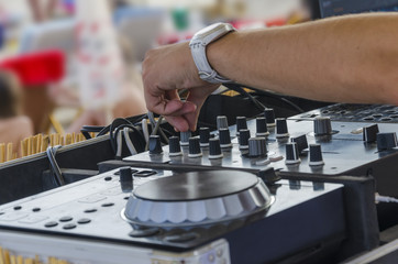 Beach party, dj mixette and equipment in focus