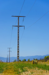 Obraz premium High-voltage power transmission towers