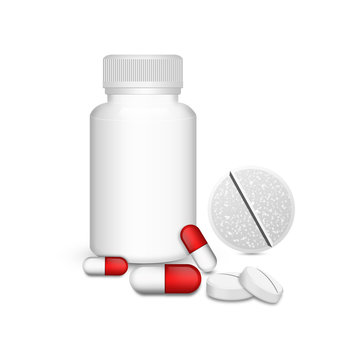 Blank medicine bottle with red capsules with pill