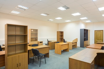 Office room with empty furniture