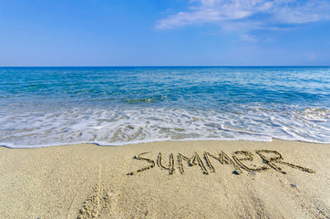 SUMMER, creative abstract graphic message on sand