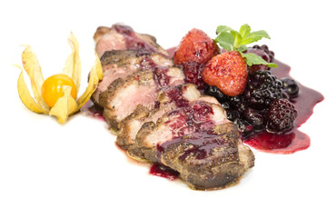 Peking duck with berry sauce on a white background
