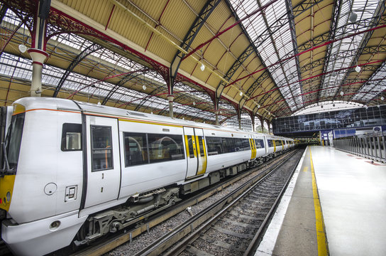 Modern Commuter Train inside Victoria Railway Station in London