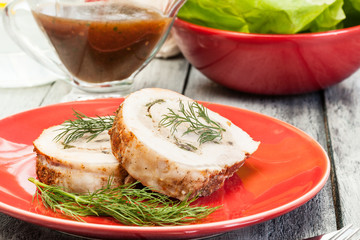 Sliced pork lion roll stuffed with mushrooms