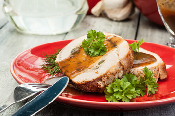 Sliced pork lion roll stuffed with mushrooms