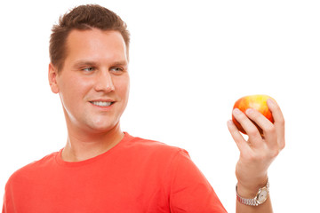 Happy man holding apple. Diet health care healthy nutrition.