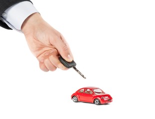toy car and car key concept for costs