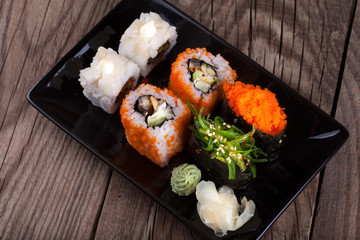 Maki Sushi on wooden background