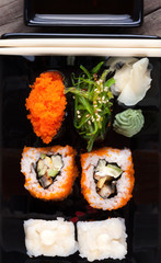 Maki Sushi on wooden background