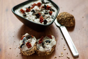 Italian appetizer sandwiches with sun-dried tomatoes and olive