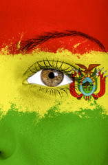 Bolivia flag painted over female face