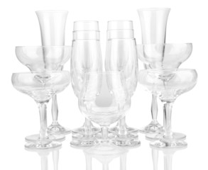 Cocktail and wine glasses, on gray background