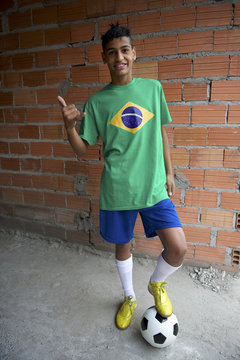 Smiling Brazilian Teen Thumbs Up with Football Soccer Ball