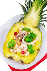 Shrimp salad served in pineapple