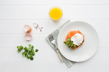 Top view of healthy breakfast with poached eggs royale