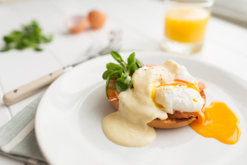 Poached eggs royale with salmon and sauce hollandaise