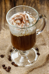 Irish coffee on wooden table