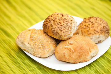 Fresh bread rolls with sunflower and sesame seeds