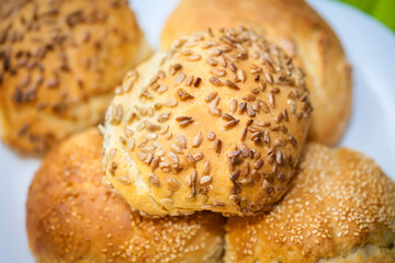 Fresh bread rolls with sunflower and sesame seeds